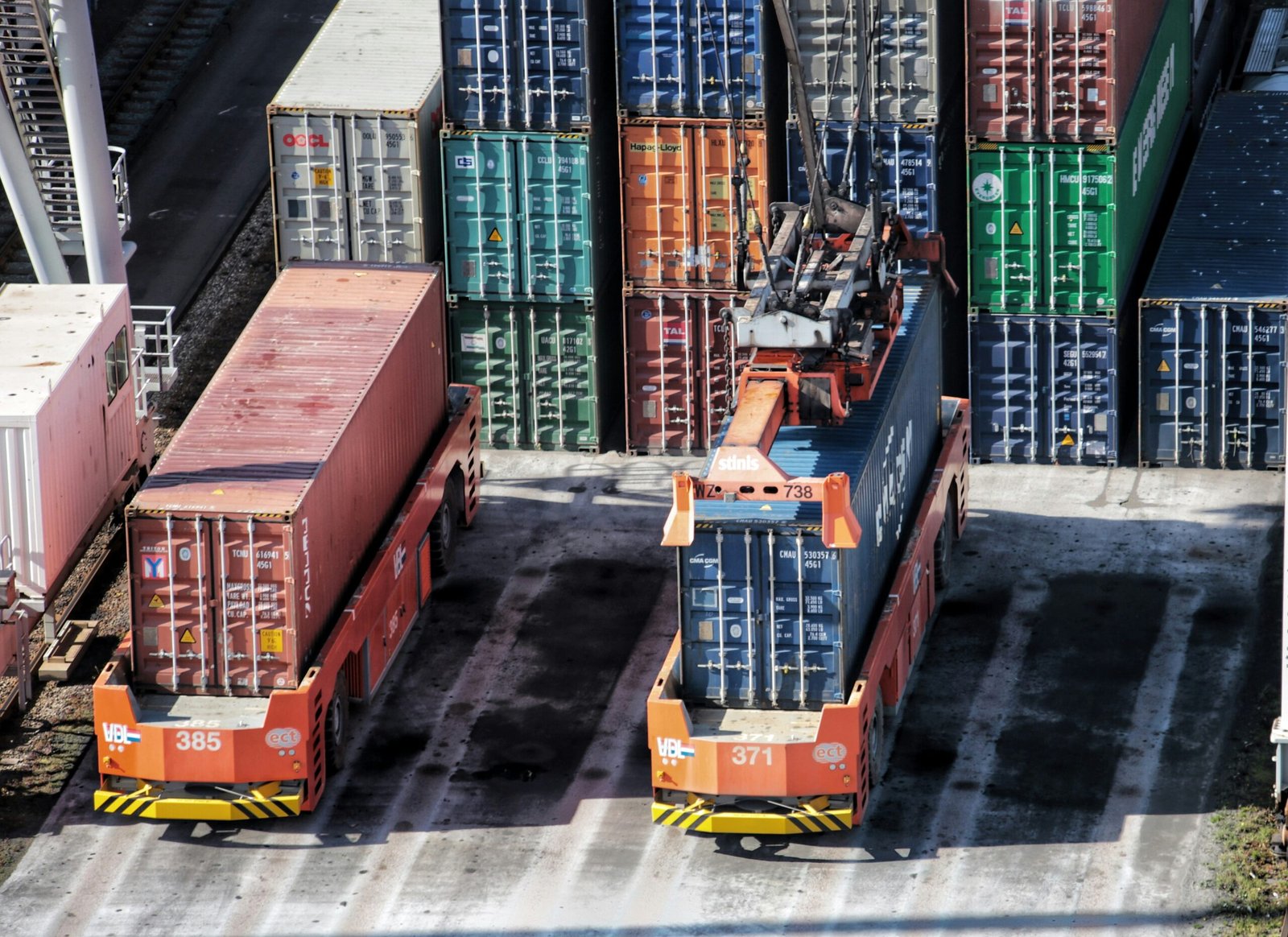 cargo containers are stacked on top of each other